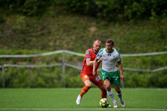 Aron Elís Thrándarson of Aalesund and Steffen Skogvang