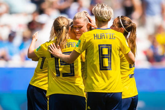 Fridolina Rolfö of Sweden celebrate with team mates