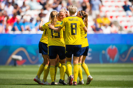 Fridolina Rolfö of Sweden celebrate with team mates