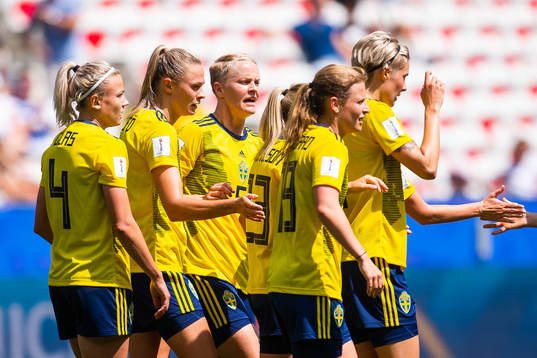 Fridolina Rolfö of Sweden celebrate with team mates