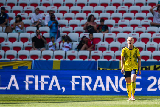 Nilla Fischer of Sweden looks dejected