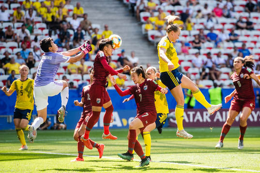 Magdalena Eriksson of Sweden against goalkeeper Waraporn