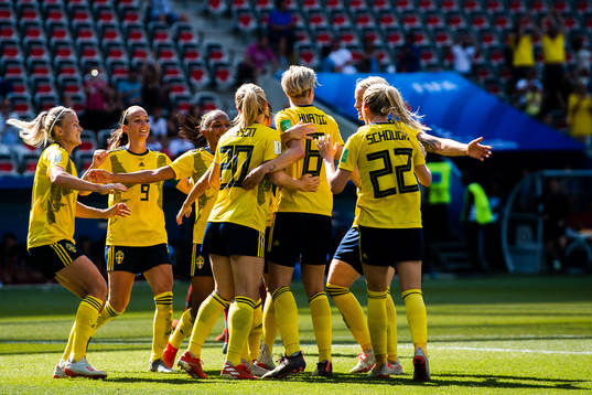 Players of Sweden celebrate the 5-1 goal by Elin Rubensson
