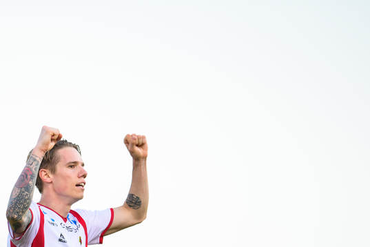 Robert Taylor of Tromsø celebrates