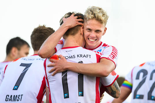 Robert Taylor of Tromsø celebrates with teammate Onni