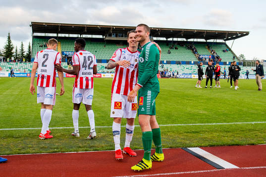 Robert Taylor and goalkeeper Gudmund Kongshavn of Tromsø