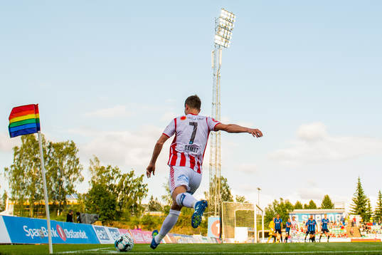 Morten Gamst Pedersen of Tromsø takes a corner kick