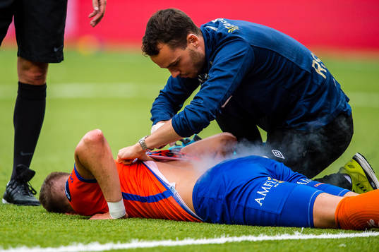 Holmbert Aron Briem Fridjonsson of Aalesund in pain