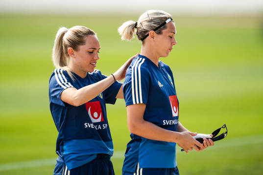 Elin Rubensson and goalkeeper Jennifer Falk of Sweden