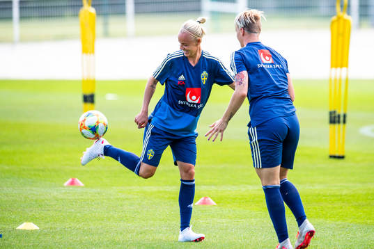 Caroline Seger and Nilla Fischer of Sweden