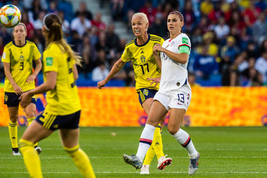 Caroline Seger of Sweden and Alex Morgan of USA