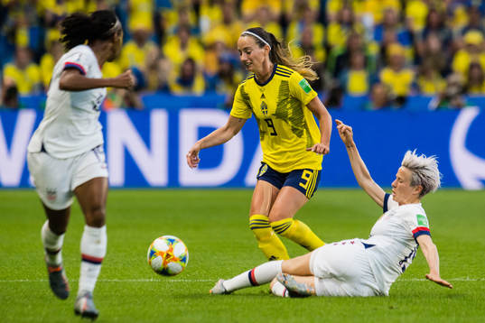 Kosovare Asllani of Sweden and Megan Rapinoe of USA