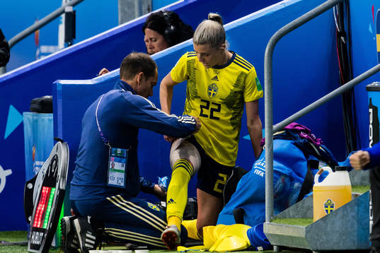 Olivia Schough of Sweden gets attended to