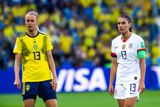 Amanda Ilestedt of Sweden and Alex Morgan of USA
