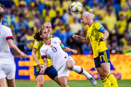 Alex Morgan of USA and Caroline Seger of Sweden