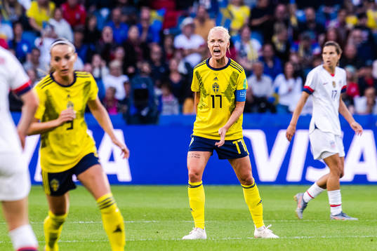 Kosovare Asllani and Caroline Seger of Sweden