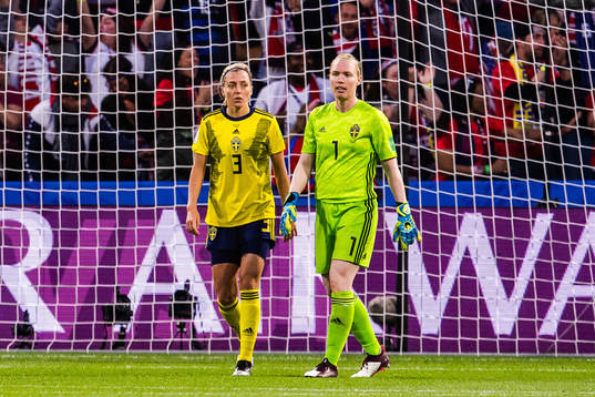 Linda Sembrant and Goalkeeper Hedvig Lindahl of Sweden