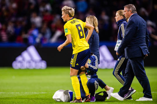 Lina Hurtig of Sweden receives treatment