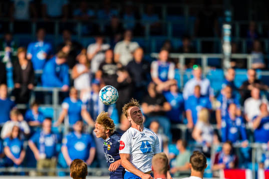 Sebastian Pedersen of Strømsgodset and Martin Skjelbreid