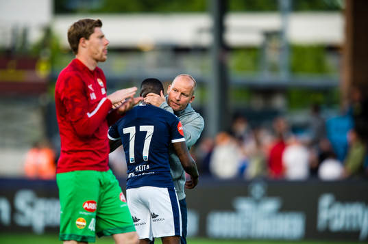 Muhamed Maudo Keita of Strømsgodset and Henrik Pedersen,