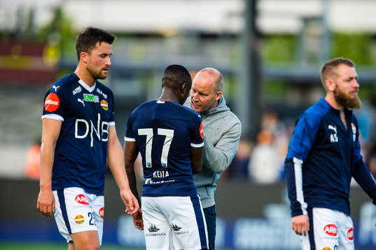 Muhamed Maudo Keita of Strømsgodset and Henrik Pedersen,