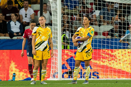 Caitlin Foord and Sam Kerr of Australia awaits a VAR check