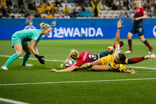 Goalkeeper Ingrid Hjelmseth and Maria Thorisdottir of