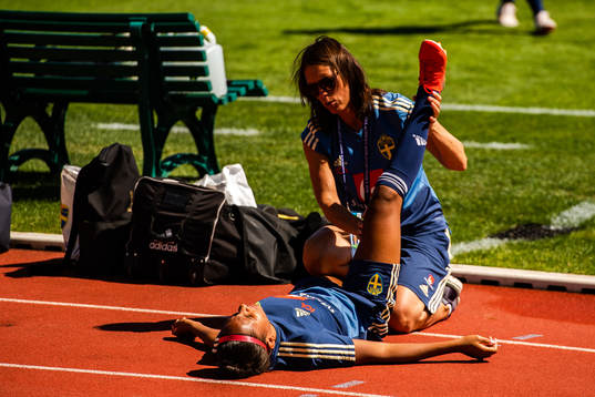 Madelen Janogy of Sweden receives treatment