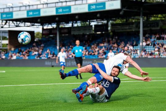 Erling Knudtzon of Molde and Mounir Hamoud of Strømsgodset