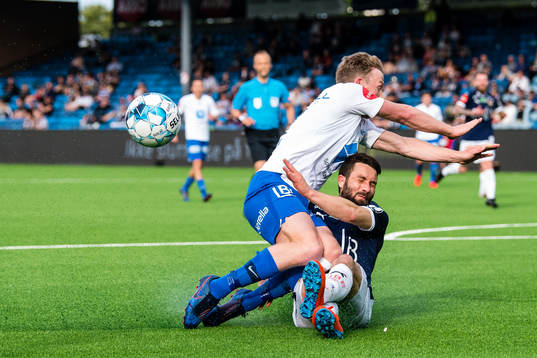 Erling Knudtzon of Molde and Mounir Hamoud of Strømsgodset