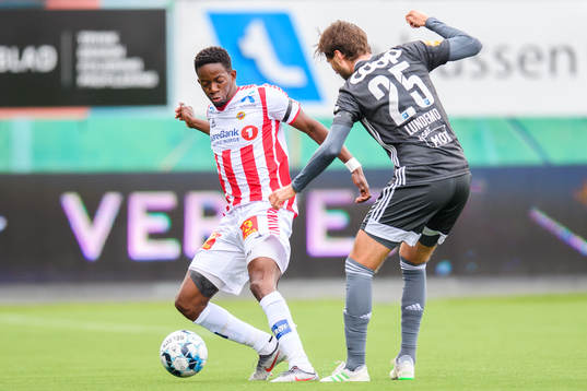 Mushaga Bakenga of Tromsø and Marius Lundemo of Rosenborg