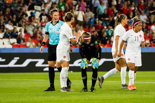 Goalkeeper Stephanie Labbe of Canada looks dejected