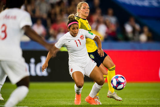 Desiree Scott of Canada and Stina Blackstenius of Sweden