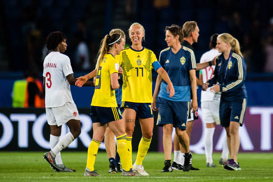 Kosovare Asllani and Caroline Seger of Sweden celebrates