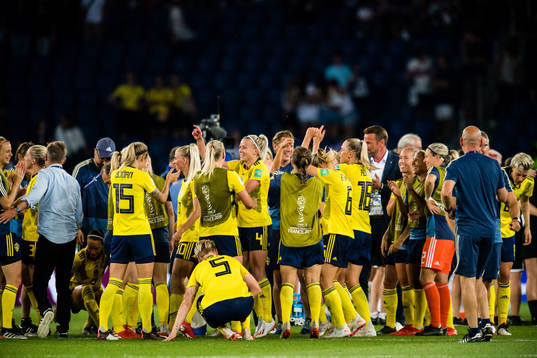 Players of Sweden celebrates winning