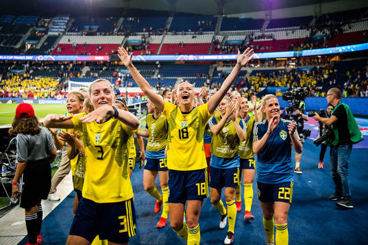 Players of Sweden celebrates winning