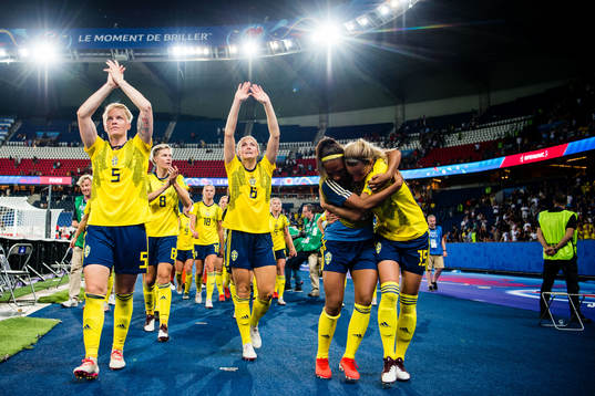 Nilla Fischer and Magdalena Eriksson of Sweden celebrates