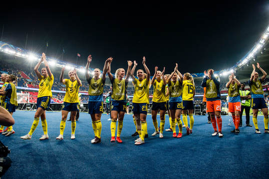 Players of Sweden celebrates winning