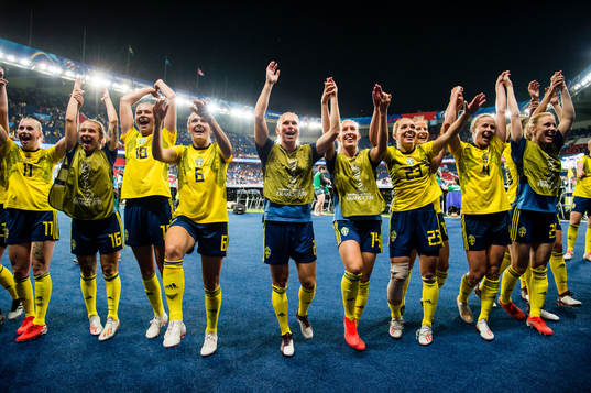 Players of Sweden celebrates winning