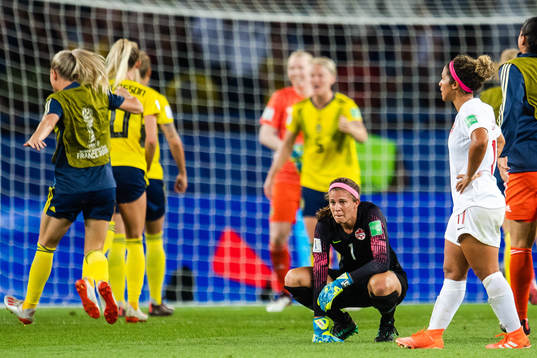 Goalkeeper Stephanie Labbe of Canada looks dejected