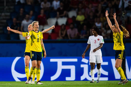 Lina Hurtig and Kosovare Asllani of Sweden celebrate