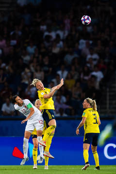 Christine Sinclair of Canada and Nilla Fischer of Sweden