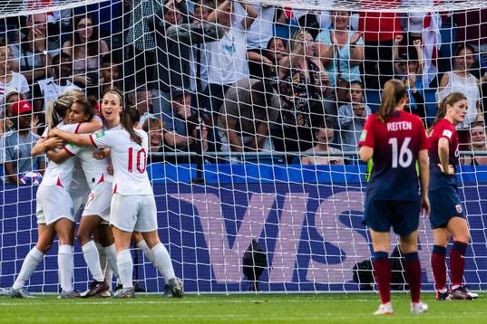 Ellen White of England celebrate with teammates