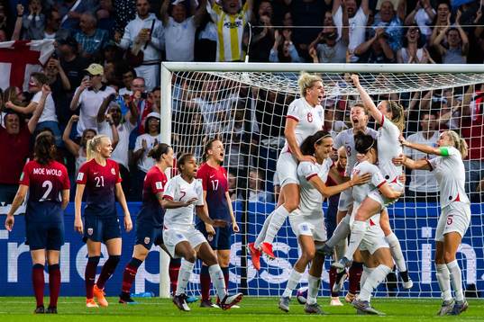 Lucy Bronze of England celebrate with teammates