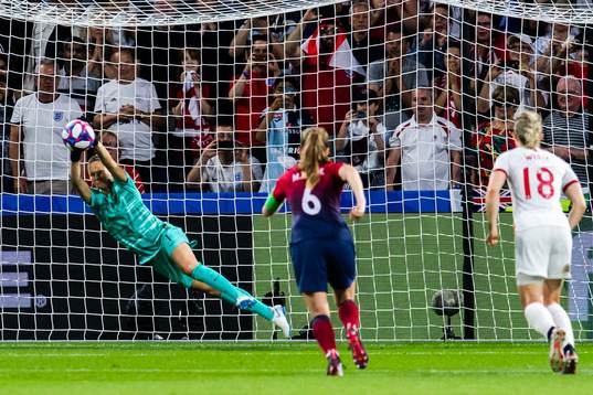 Goalkeeper Ingrid Hjelmseth of Norway saves a penalty