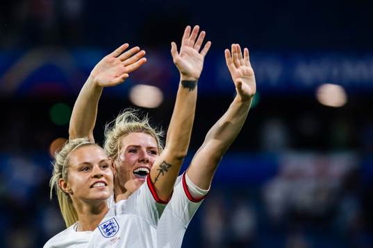 Rachel Daly and Millie Bright of England celebrate