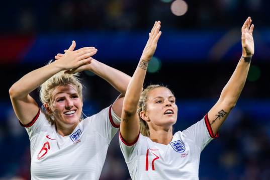 Millie Bright and Rachel Daly of England celebrate