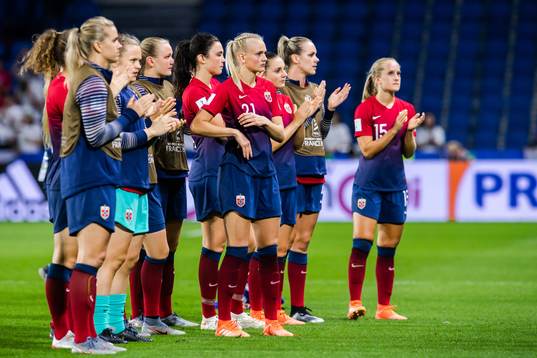 Karina Sævik of Norway look dejected with teammates