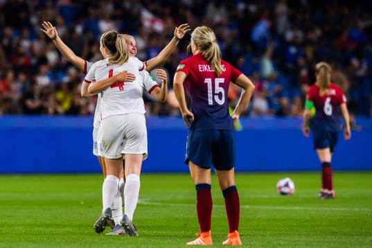 Keira Walsh and Beth Mead celebrate