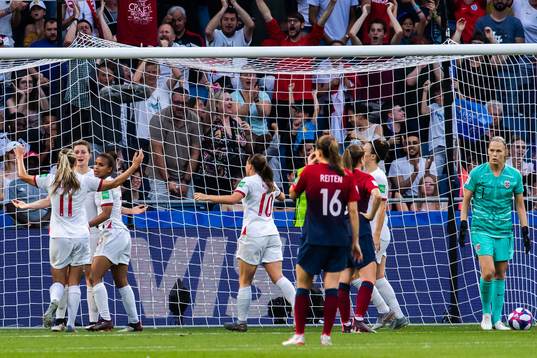Ellen White of England celebrate with teammates